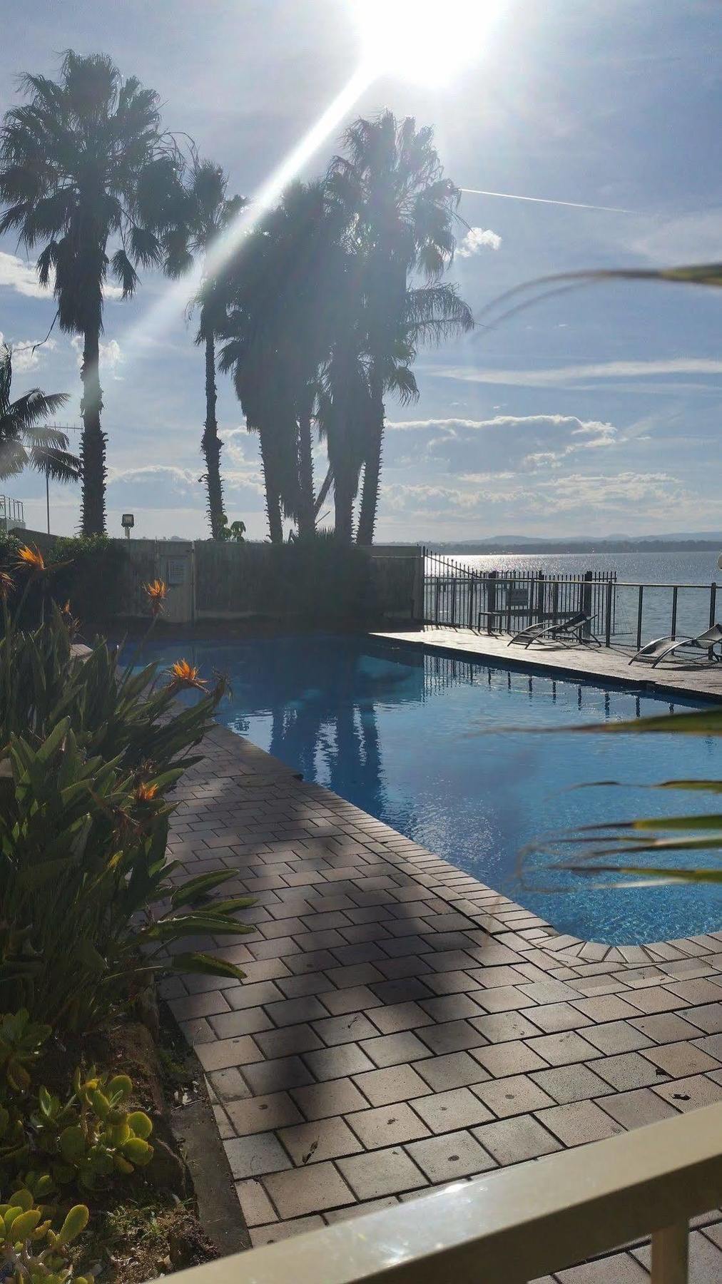 The Beachcomber Hotel & Resort, Ascend Hotel Collection Toukley Bagian luar foto View of the pool at the hotel